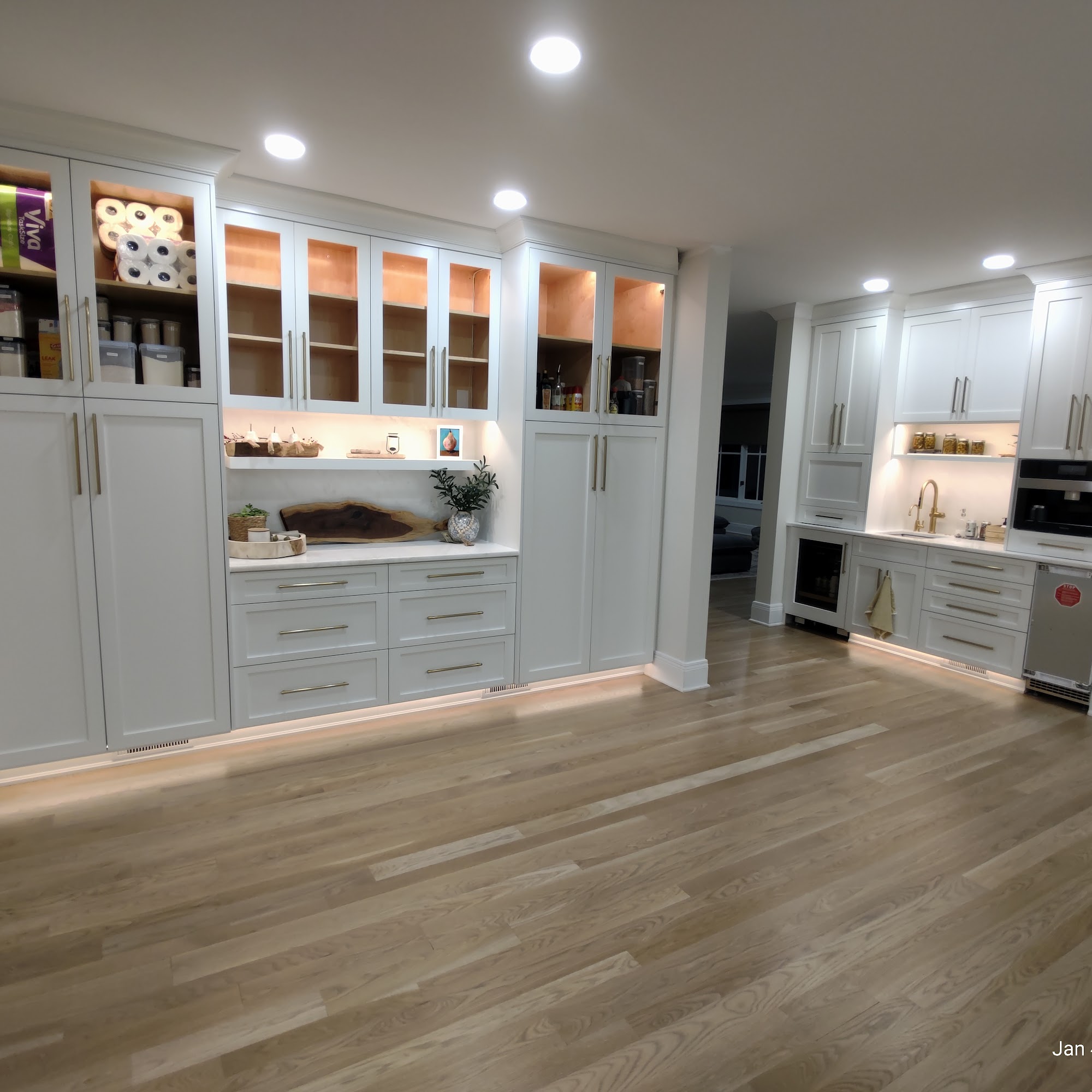 Bright kitchen with finished lighting and fixtures